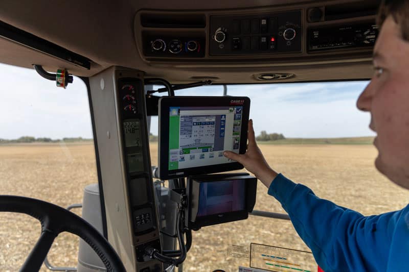 central united coop ag service center equipment precision ag man working in combine with computer screen